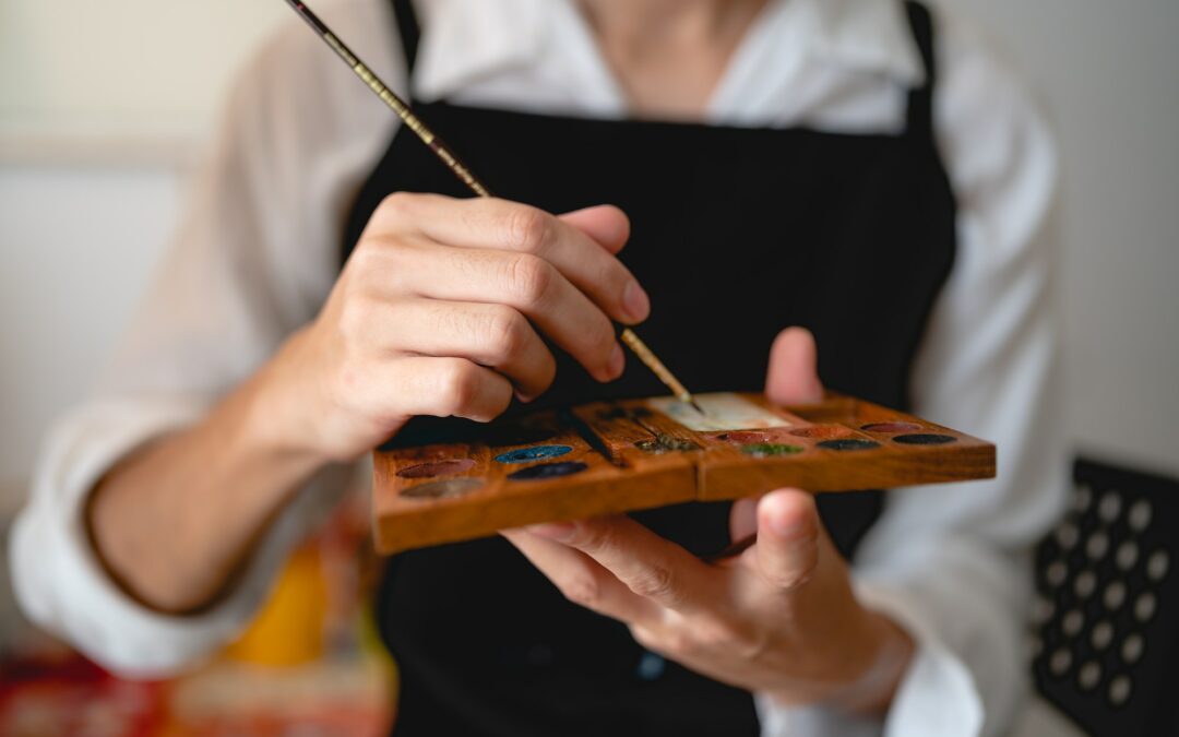 creative artist working on colours art drawing picture with brush paint, watercolor paintbrush